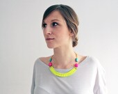 Neon statement collar necklace with colorful faceted gemstones