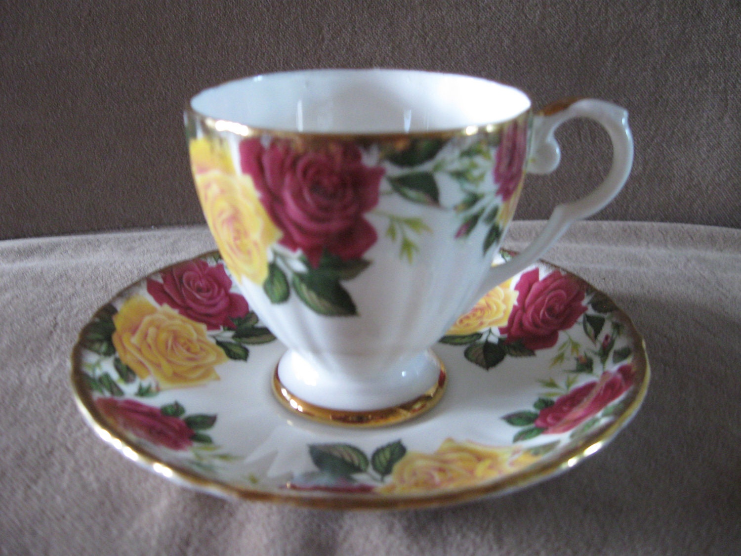 Royal Grafton yellow/red rose tea cup and saucer