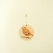 Little bird hanging. Stoneware.