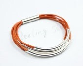 Sterling silver tubes bracelet, orange leather bracelet, silver plated magnetic clasp