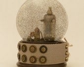 Radio Silence snowglobe with vacuum tube and brass embellishments