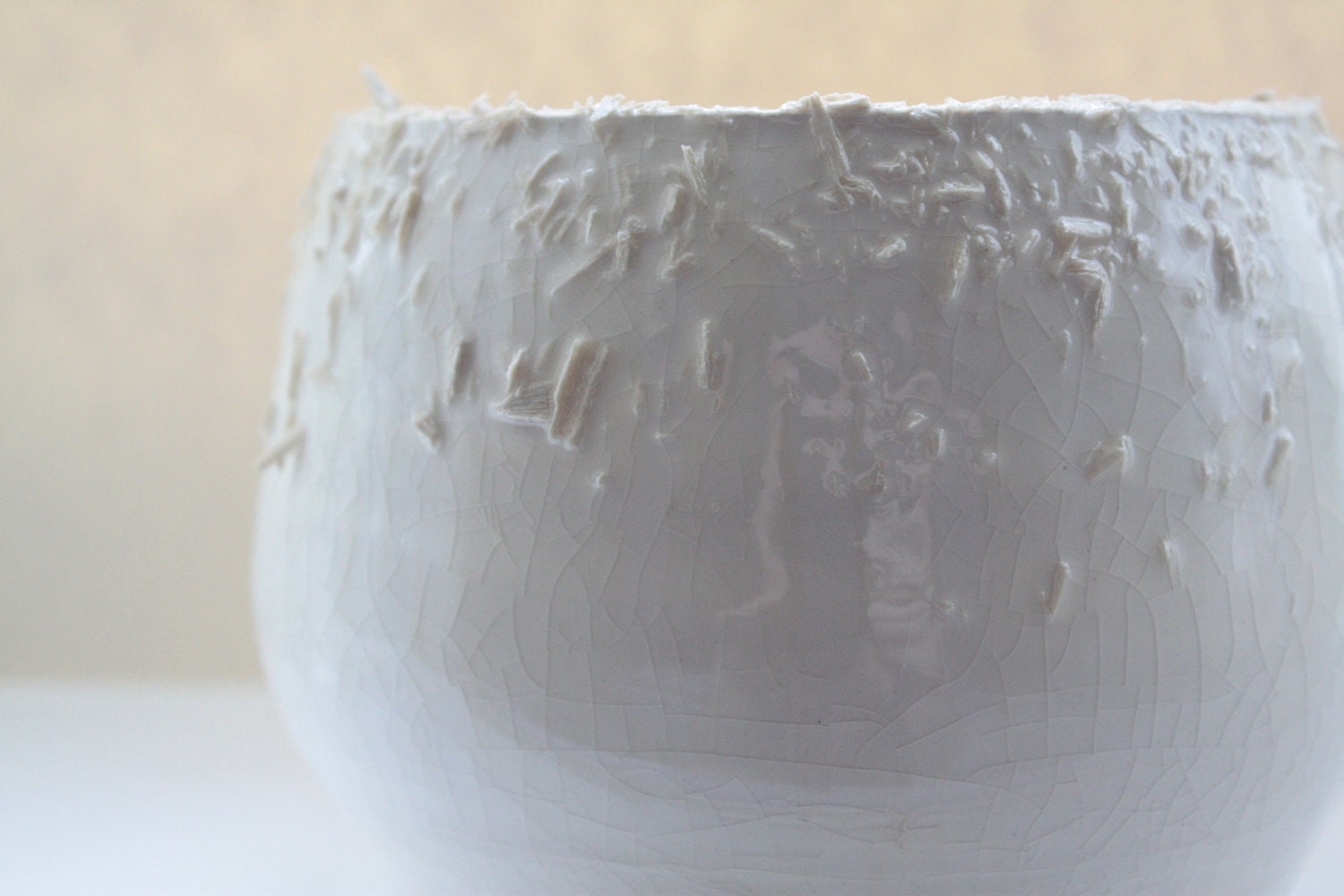Unusual earthenware bowl with a unique textured rim.