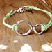 Infinity Bracelet Silver with Green Wax Cord