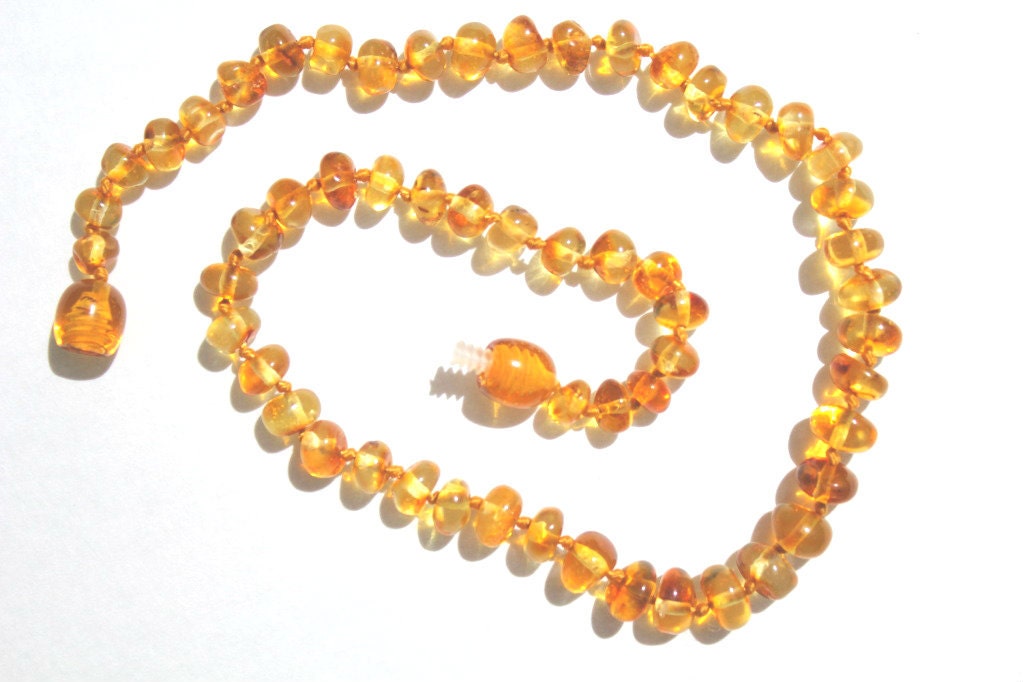 Baltic Amber Teething Necklace for your baby handmade knotted baroque honey