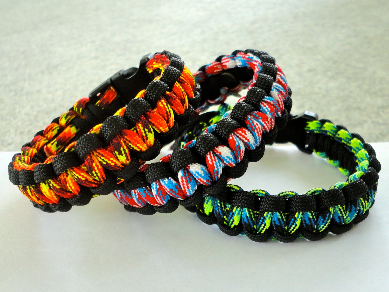 New Paracord Bracelet Pinwheel Seesaw camo red white blue orange blue green black Made in u.s.a.