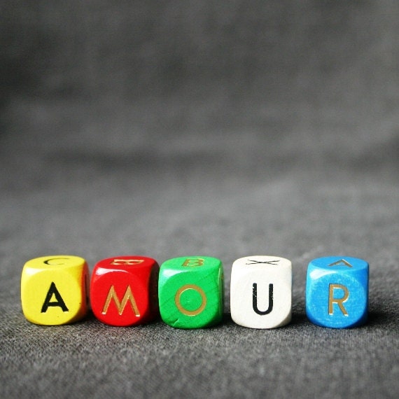 Vintage letter dice game. Play with words in color.