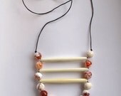 Tribal beaded necklace with faceted amber colored agates bone beads on black leather cord geometric Fall fashion