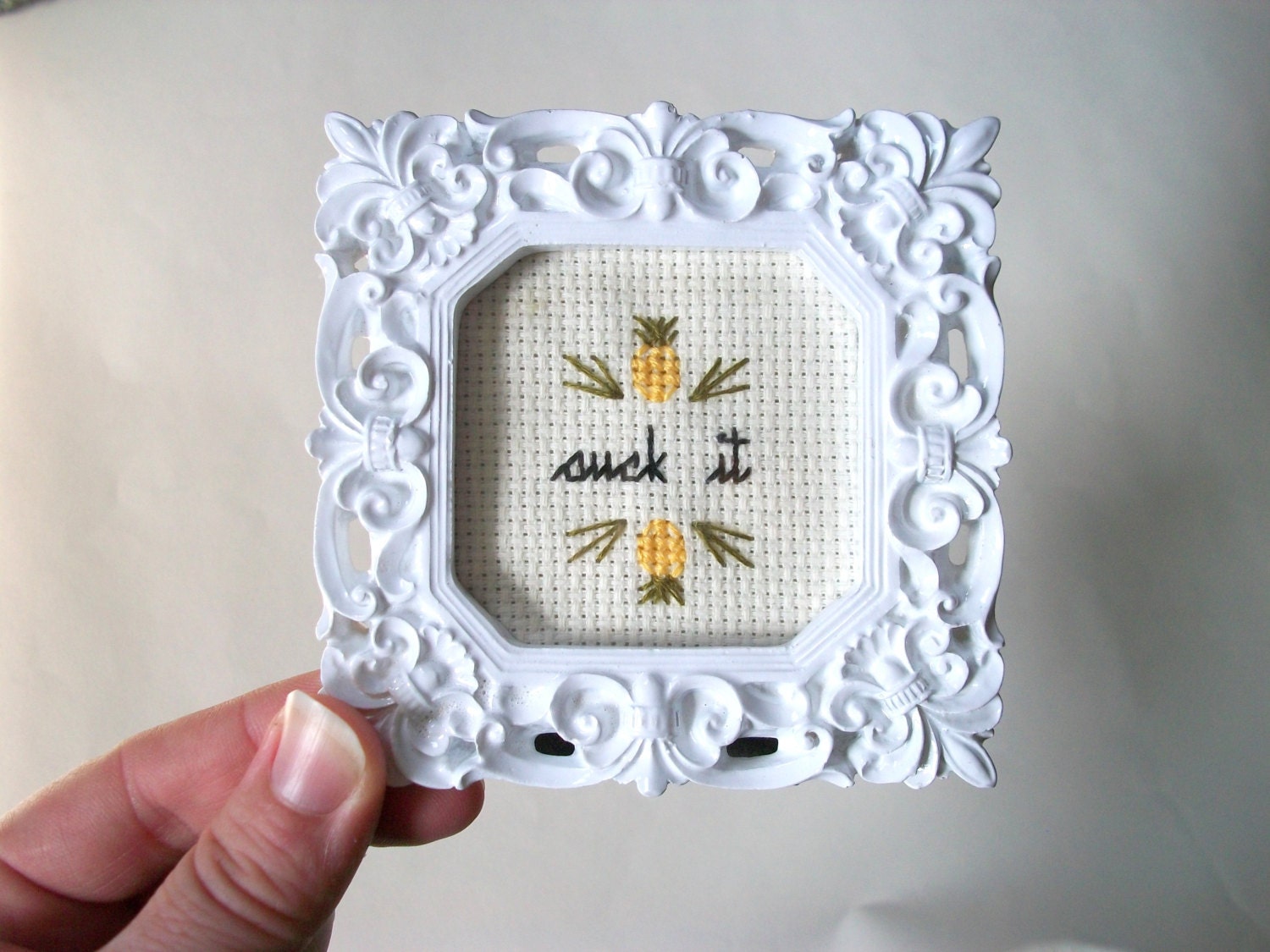 Suck it cross stitch -- small framed cross stitch gift with ironically welcoming, deliciously flavored pineapple or with flower motif