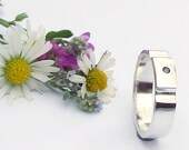 Solitaire - blue diamond ring