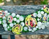 Statement Fabric  Necklace " Garden Party"    Rolled Roses and heavy Beadwork in Ivory and Greens. Roses Red and Yellows