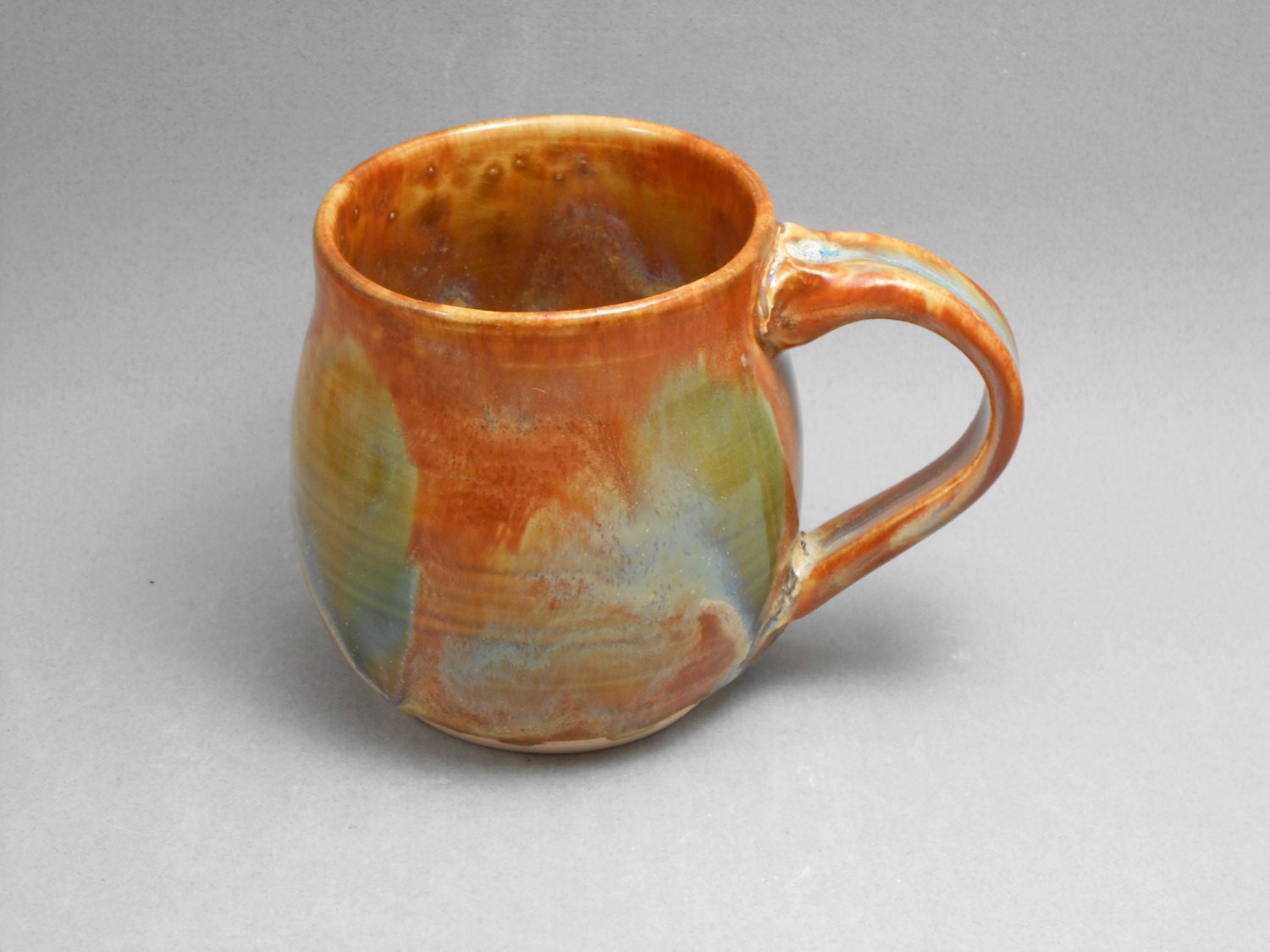 Handmade ceramic mug, coffee or tea cup, red gold with light green O12