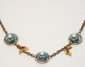 Cerulean Flower Charm Necklace - blue flower, wire-wrapped, gold leaves, Christmas gift for her