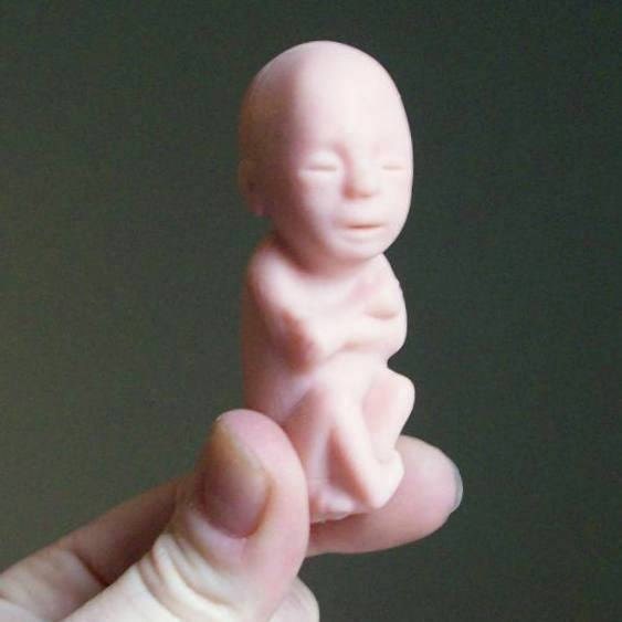 1 creepy rubber fetus, pink