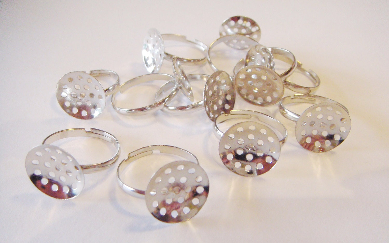 RAEWADOLLY 10pcs Ring Pad with round holes, Adjustable, Blank Findings, Steel Tone FREE SHIPPING