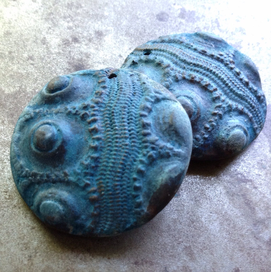 Ancient Bronze Knobby Urchin Pendant.