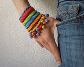 Cronian  ... Freeform Crochet Cuff  -  Red Green Orange Blue Indigo - Rainbow - Beaded Beadwork