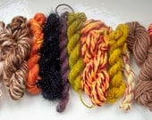 Commercially spun mini skeins Autumn Woodland green orange brown 96 yards minimum