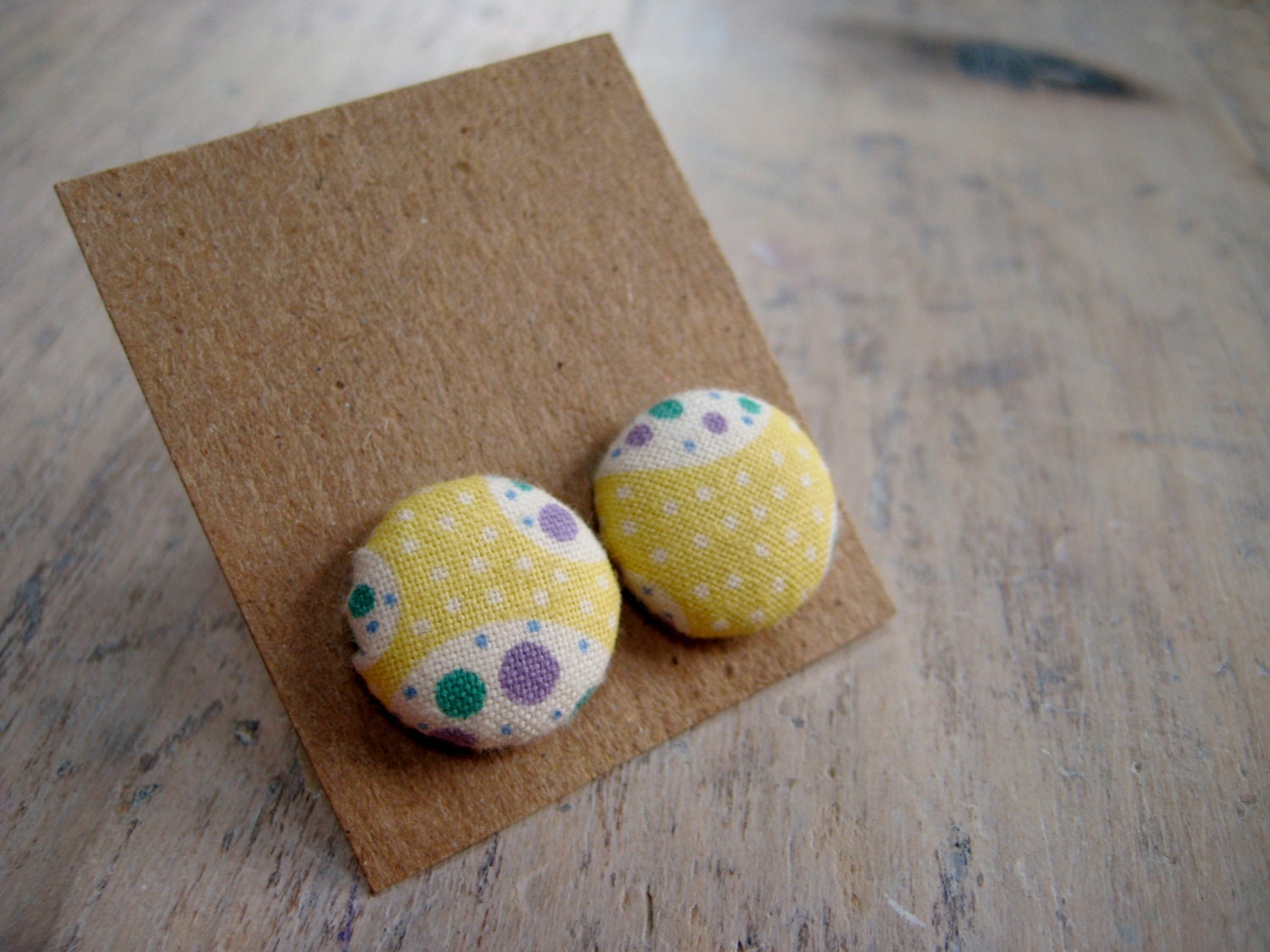 button earrings - light yellow with green and purple, kind of 70's inspired
