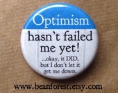 optimism hasn't failed me yet - pinback button badge