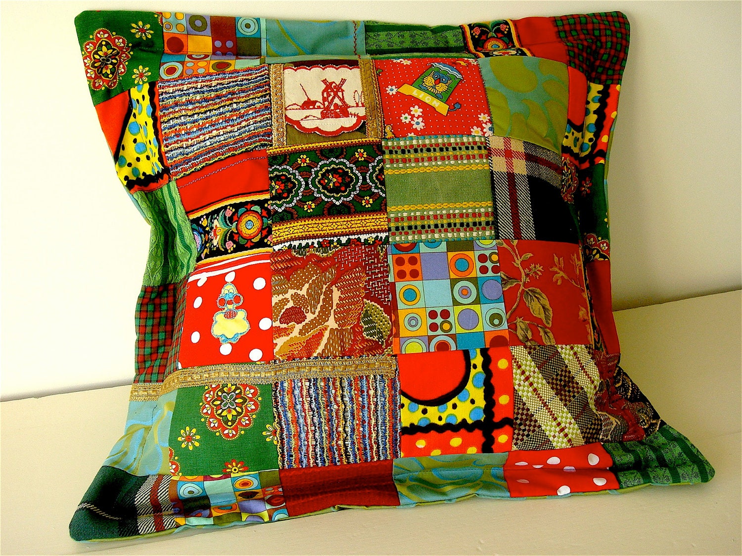 patchwork multi colour pattern cushion
