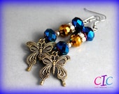 Blue and bronze butterfly earrings