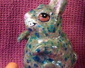 Rabbit sculpture handmade in the USA from a lump of clay guaranteed to bring you luck with 4 intact rabbit feet ooak