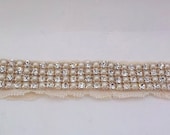 Ivory garter with pearl and rhinestone trim