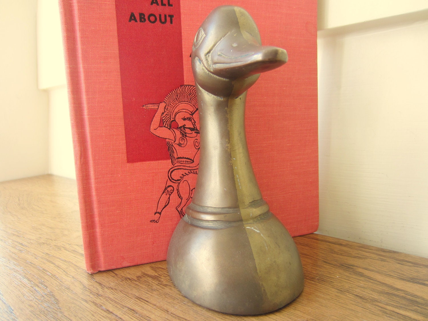 Brass duck head bookend.