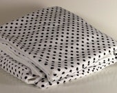 large baby blanket double sided black dot motif, soft cozy white flannel on back