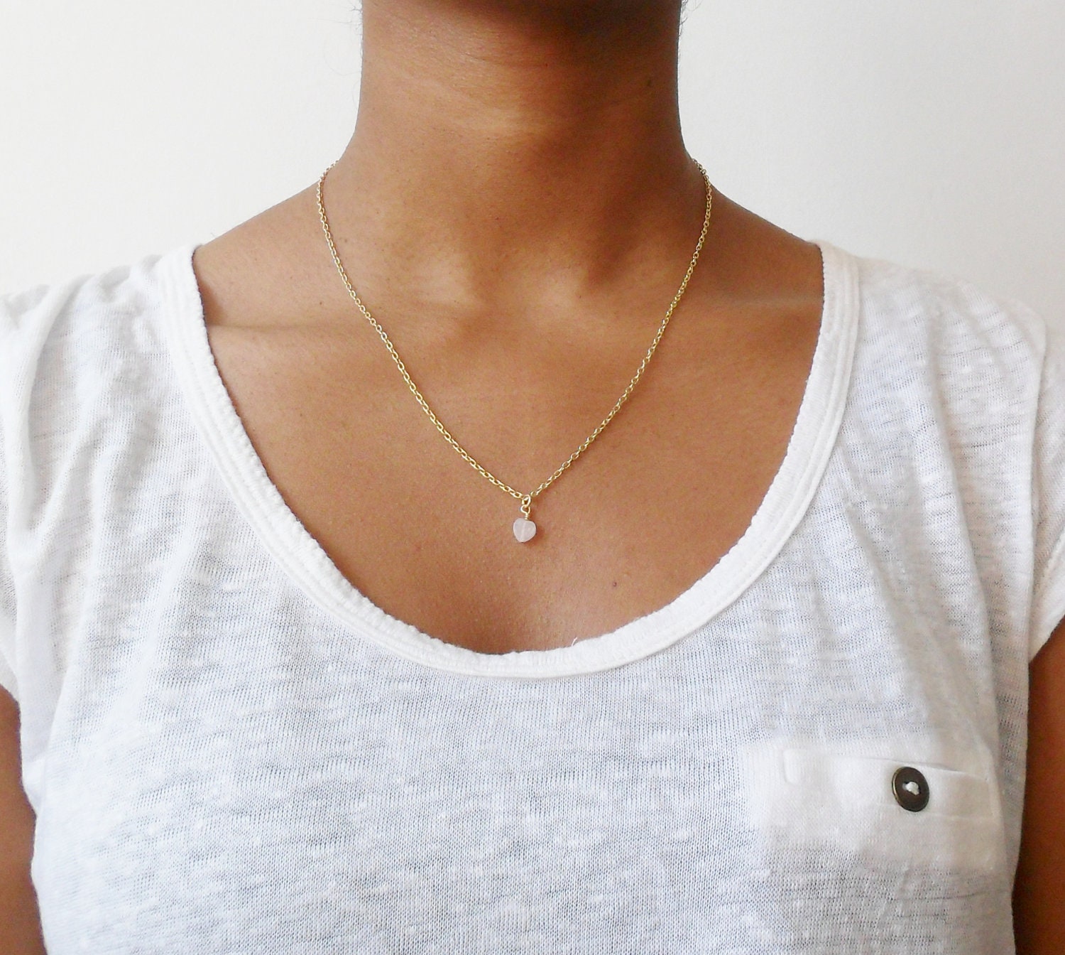 Small Rose quartz heart gemstone pendant on gold chain
