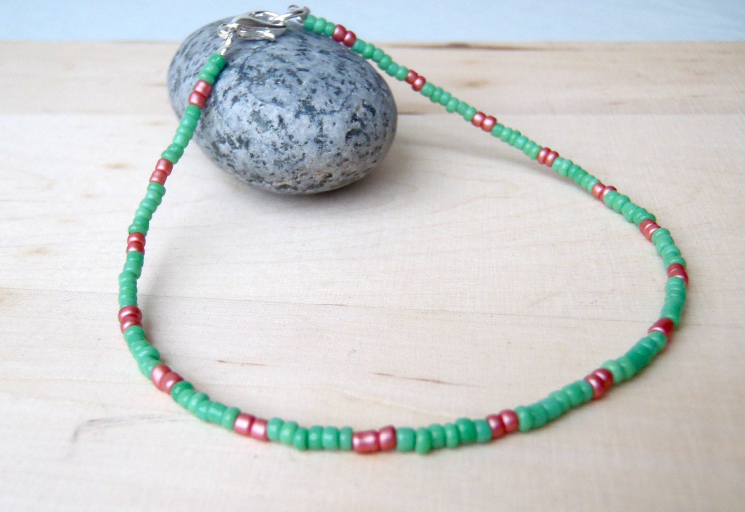 anklet in aloe Green and brushed metallic Pink