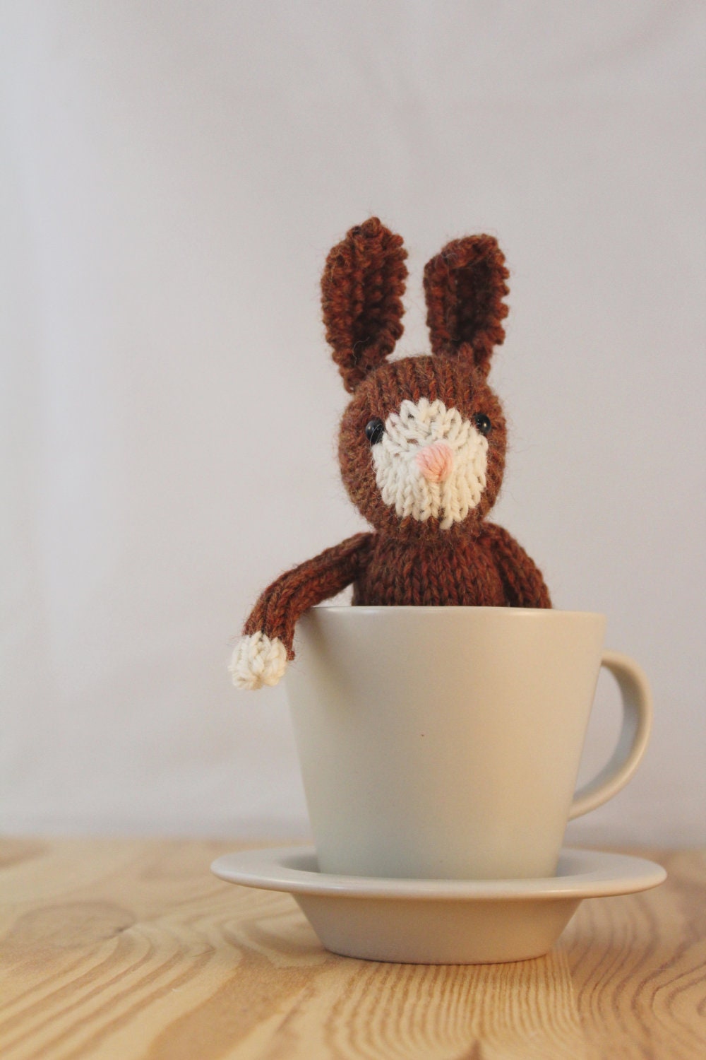 Little knitted bunny in spice and white, small stuffed rabbit bunny