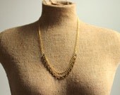 Strand Necklace with Gold Plated Layered Chains and Vintage Brass