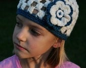 Cream and teal crochet cluster hat with flower