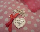 Make me a mixtape necklace - bring out the retro girl GRRRRR - beautiful red ribbon