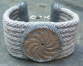 Whirligig, handbeaded kumihimo cuff with adjustable clasp