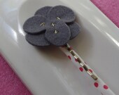 Grey wool felt flower hair clip with gold stitching