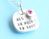 All we need is LOVE necklace, pendant with RUBY, eco-friendly silver.  Handcrafted by Chocolate and Steel