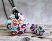 Swirly flowers. Jewelry set.  Polymer clay. Funky,  fun necklace earrings. colorful, boho, bohemian, leather clay, orange teal purple
