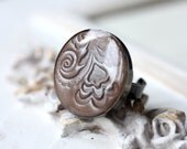 Chocolate brown ring with lace print and pearl finish