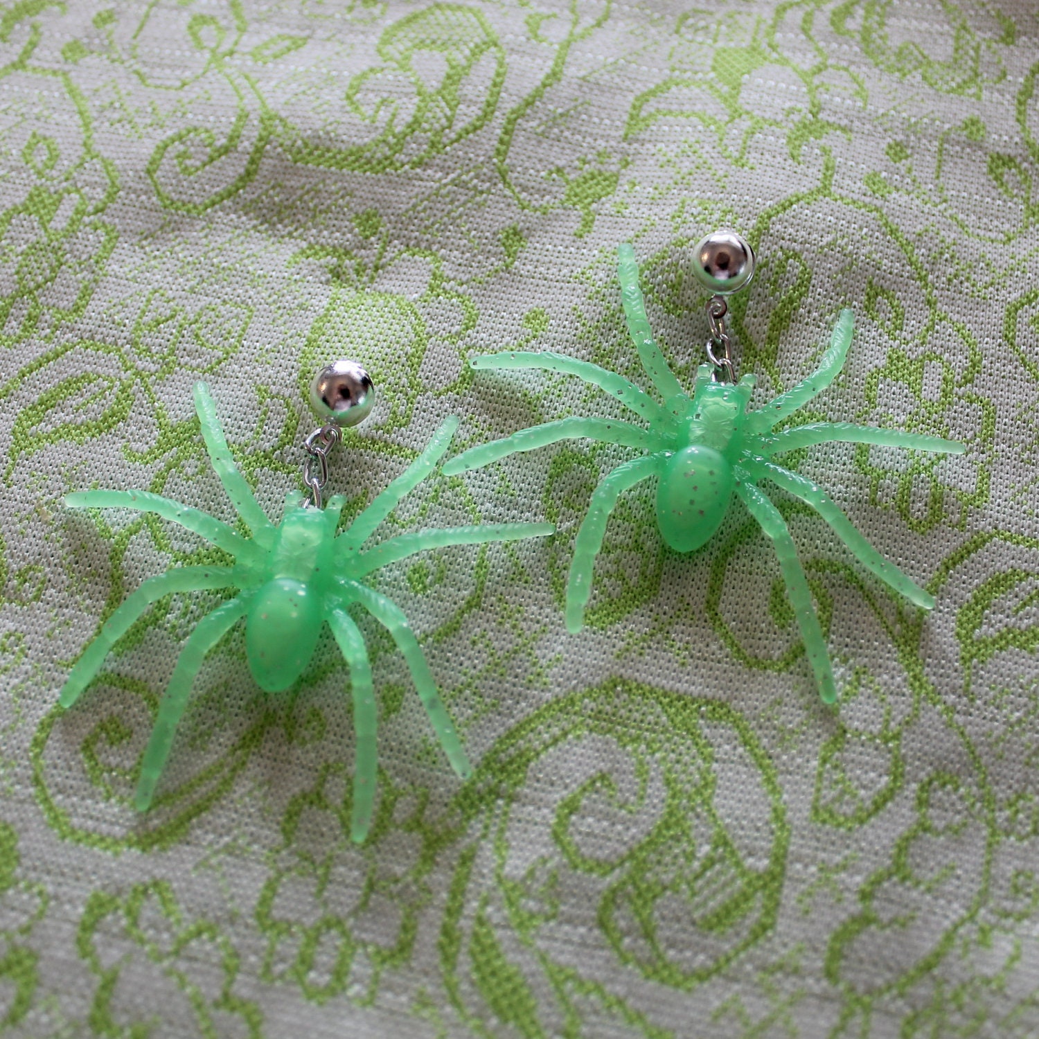 creepy green spider earrings
