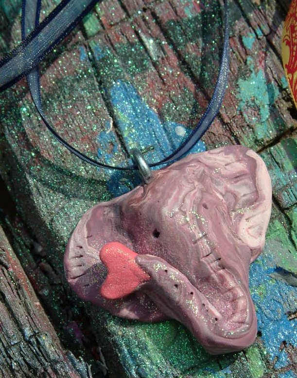 Sweet simple abstract elephant with heart pendant on sheer blue ribbon