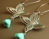 Butterfly Patina Earrings on Brass with Aqua Flower .  Teal Patina Dangle Boho . Flutter