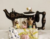 Vintage SEWING Machine tea pot ... raised decor