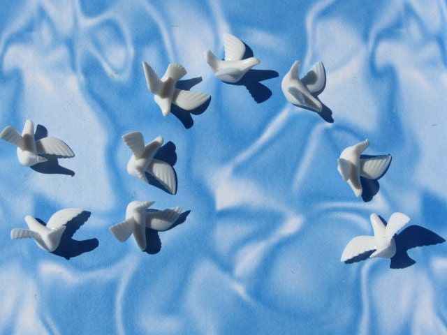 white plastic doves