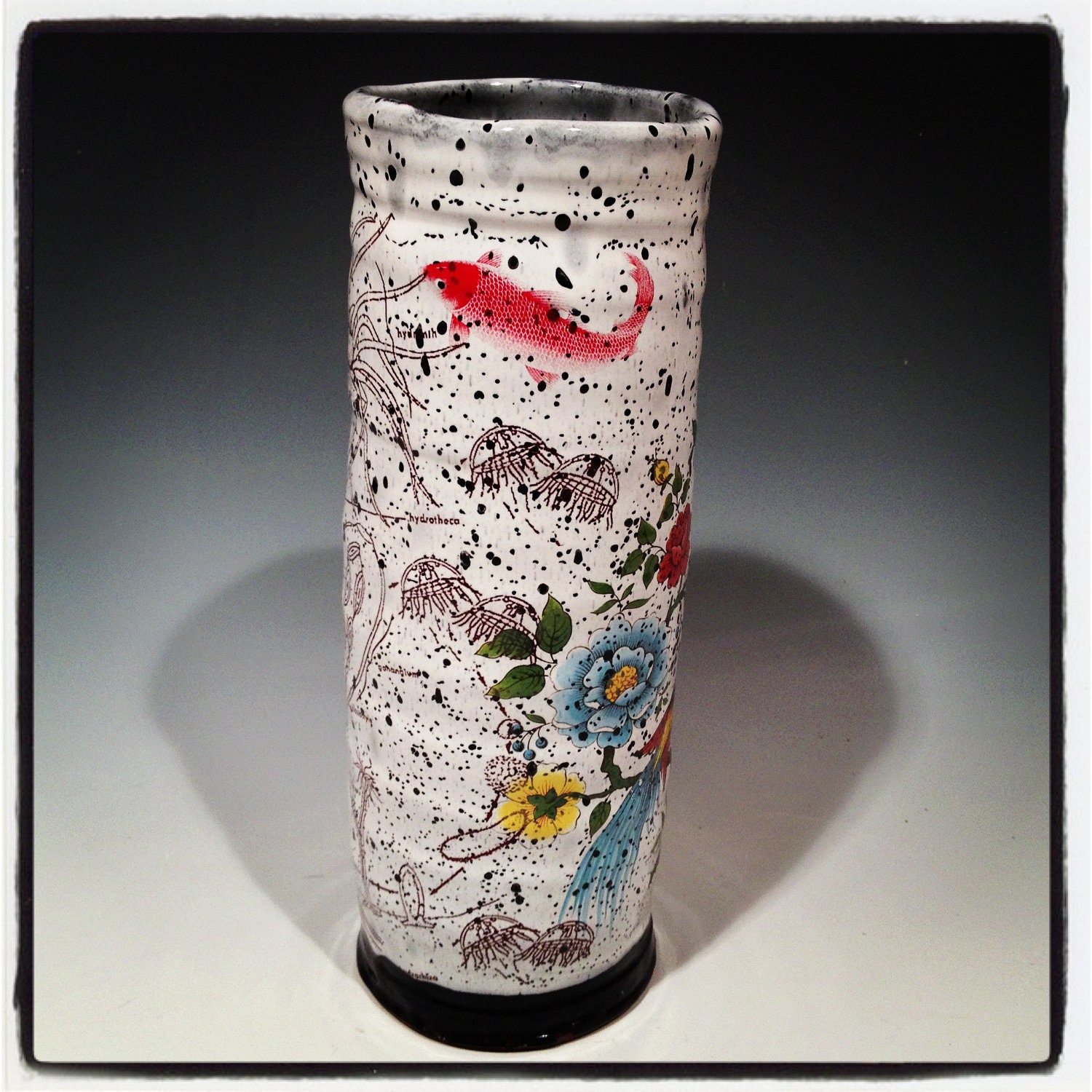 Earthenware vase with colorful flowers