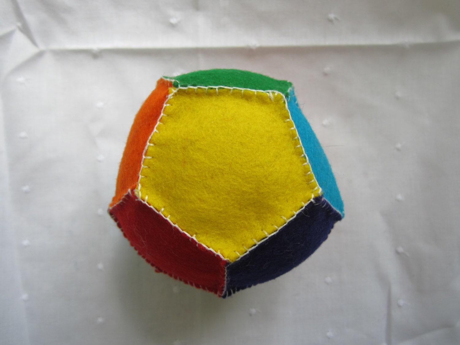Dodecahedron that is Hand-Embroidered and made from Wool Felt - 12 Pentagons in a Rainbow of Colors