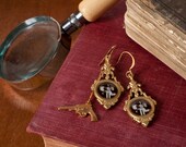 I Suggest it was Ms. Emerald with the Revolver Earrings