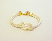 Ivory knotted nautical rope bracelet with gold anchor charm