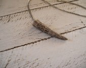 Upcycled tribal pattern engraved antler necklace